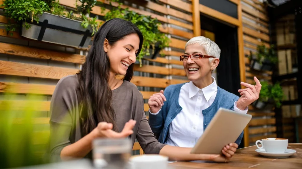 Two family members discussing their business